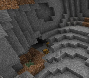 A troll hoard near the entrance of a cave.