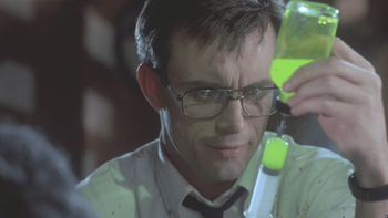 Herbert West with syringe of re-animating fluid.
