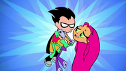 Teen Titans Go! Starfire is in Robin's arms