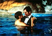 Pam with Bond in the pool as Bond returns his feelings to her