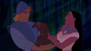 Pocahontas-disneyscreencaps.com-4783.jpg (195 KB) John being taught by Pocahontas to walk in a stranger's footsteps as she shows him the bear is a mother to cubs.