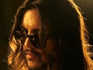 Ash Kabosu in the With Rob As My Witness music video