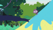 Purple Monkey runs up tree