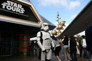 A Stormtrooper in front of the attraction participating in the CHOC Walk, a Walk-A-Thon for Children's Hospital of Orange County