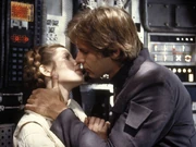 In a memorable scene from , romance blossoms between  and Princess Leia.