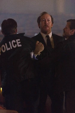 Jacob being taken away at the crime scene