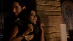 Michael subdues Mazikeen after she refuses to aid him any longer