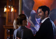 112 promo Lucifer Chloe looking at painting