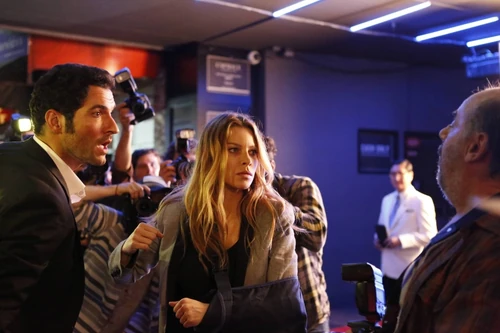 Lauren German and Tom Ellis behind the scenes of Season 1