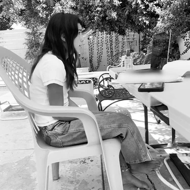 Scarlett Estevez at a table read over Zoom for Season 6.