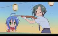 Yui attempts to use the rifle a game