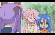 Kagami greeting Konata and Miyuki on her birthday