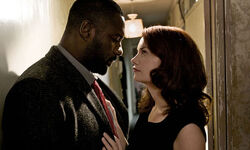 Alice attempts to coerce Luther into fleeing the country with her.