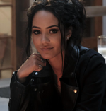 Tristin Mays as Riley Davis