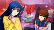 Minmay receiving Hikaru's first medal as a gift.