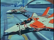 A VF-1A parked beside a VF-1D Valkyrie