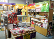 A wide assortment of Macross merchandise on display at the museum store.