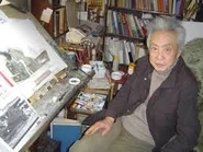 TakaniWork.jpg (10 KB) Takani and his art studio.