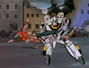 Roy Fokker escapes with the VT-102 cockpit that has Hikaru and Minmay inside.