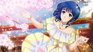 Minmay enjoying sakura season amidst falling cherry blossoms in an Uta Macross event.