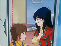 Minmay and Yoshio discussing what is going on outside.