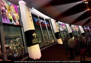 A mock-up of the viewing deck, which has screens filled with Walküre and other Macross-related media.