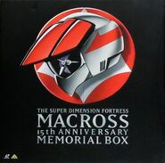 The cover to the 15th anniversary Laserdisc box of of Super Dimension Fortress Macross.