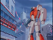 VT-102 in Battroid mode standing in front of the Nyan-Nyan Chinese Restaurant (Episode 2)