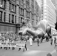 The Sinclair Oil Dinosaur was punctured by a lamppost at Columbus Circle in 1964.