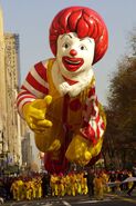 Ronald McDonald's left arm was ripped by a tree in the 2001 Parade.