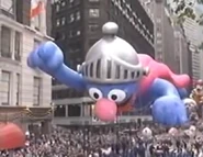 Super Grover leads the parade into Herald Square during the 2004 parade NBC telecast