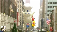 The Pillsbury Doughboy giggles through NYC for the first time, preceding Santa Claus during the 2009 NBC telecast. (Screenshot: NBC)