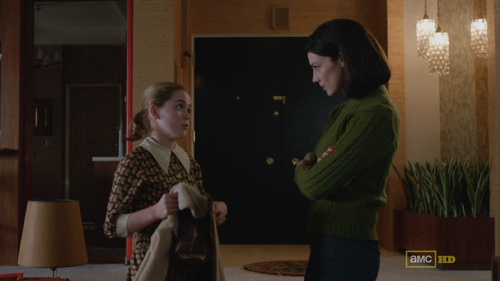 #1 The "Guilty Pleasure Green Sweater" sweater. This is the third time she has worn it.