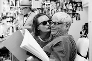 Elisabeth Moss & Robert Morse on set