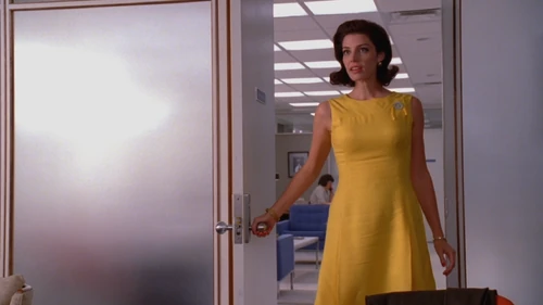 #1 The "Yellow Repeater" dress. This is the first outfit Megan has worn twice. The horror.