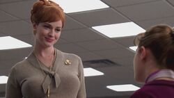 Joan schooling Peggy in ladies room.jpg