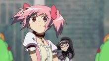 Madoka looks at the direction of the Familiars