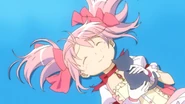 Madoka holding Amy