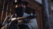 Paulie holding a Tommy Gun in prerelease screenshot
