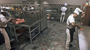 Cooks working in the kitchen of Sammy's Bar