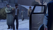 Detectives arresting Vito