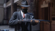 Tommy holding a Shotgun in prerelease screenshot