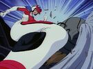 Cutie Honey as a biker attacking an enemy