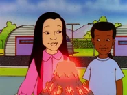 Carmen from the book series showcasing her volcano.