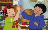 Carlos and Ralphie doing a high-five