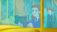 Ms. Frizzle using the bulldozer Bus to exit the cave.