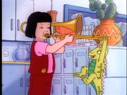 Wanda playing the trombone