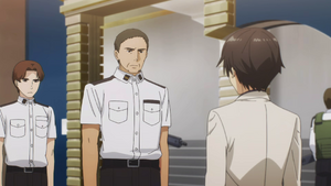 Kazama and Sanada explaining the situation to Tatsuya