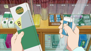 S1E4 Kobayashi holding stationery