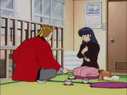 Kyōko talking to Iioka after Kozue and Godai left